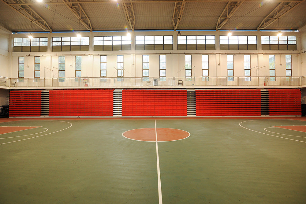 stadium seats retracted in a basketball court