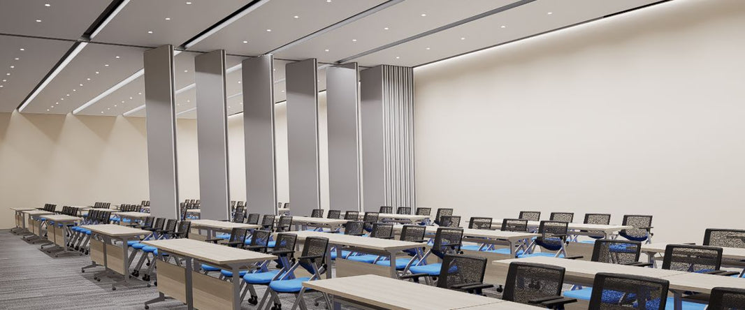 An operable wall in a lecture room, designed to divide the space for flexible use